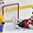 PLYMOUTH, MICHIGAN - April 1: Switzerland's Florence Schelling #41 and Sarah Foster #3 watch as Sweden's Hanna Olsson #26 shot goes into the net to make it 1-0 Sweden during preliminary round action at the 2017 IIHF Ice Hockey Women's World Championship. (Photo by Minas Panagiotakis/HHOF-IIHF Images)